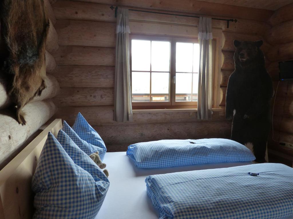 Voodi või voodid majutusasutuse Holzberghof toas