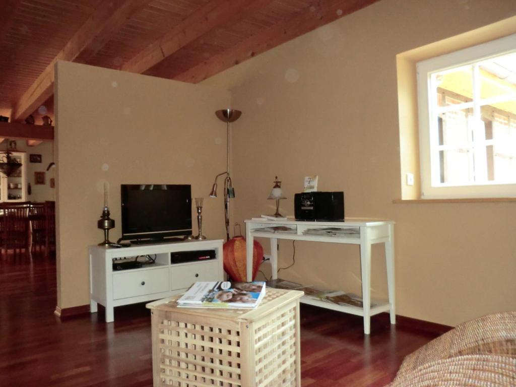 TV a/nebo společenská místnost v ubytování The Cosy Home