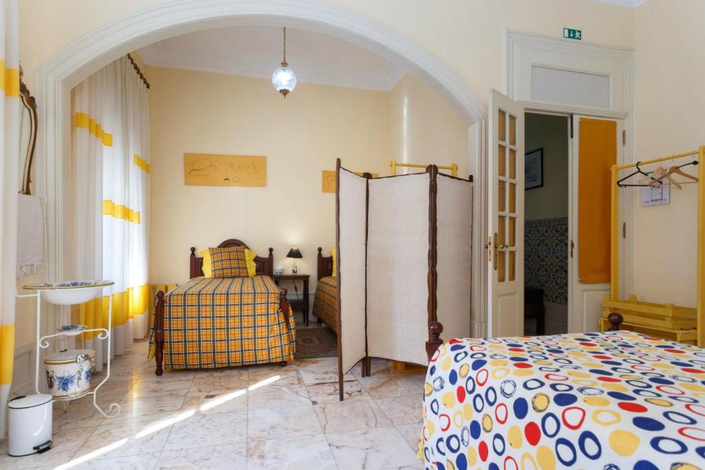 Postel nebo postele na pokoji v ubytování 18St. Hostel