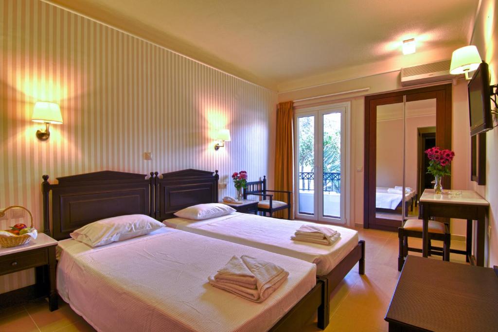 Postel nebo postele na pokoji v ubytování Fortezza Hotel
