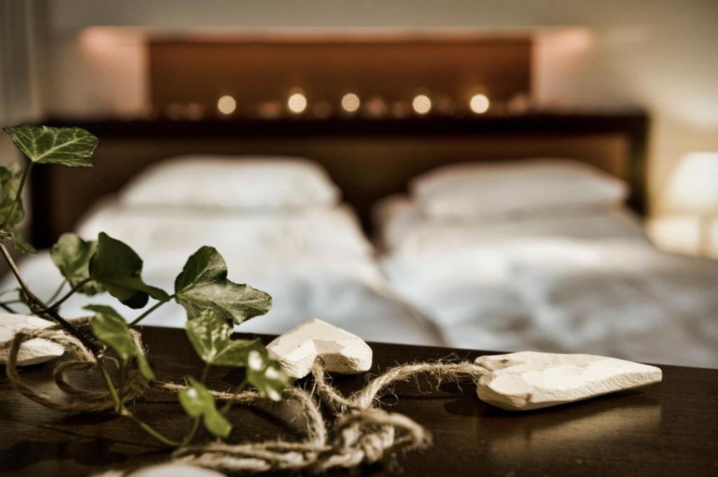 A bed or beds in a room at Appartements Lüftenegger