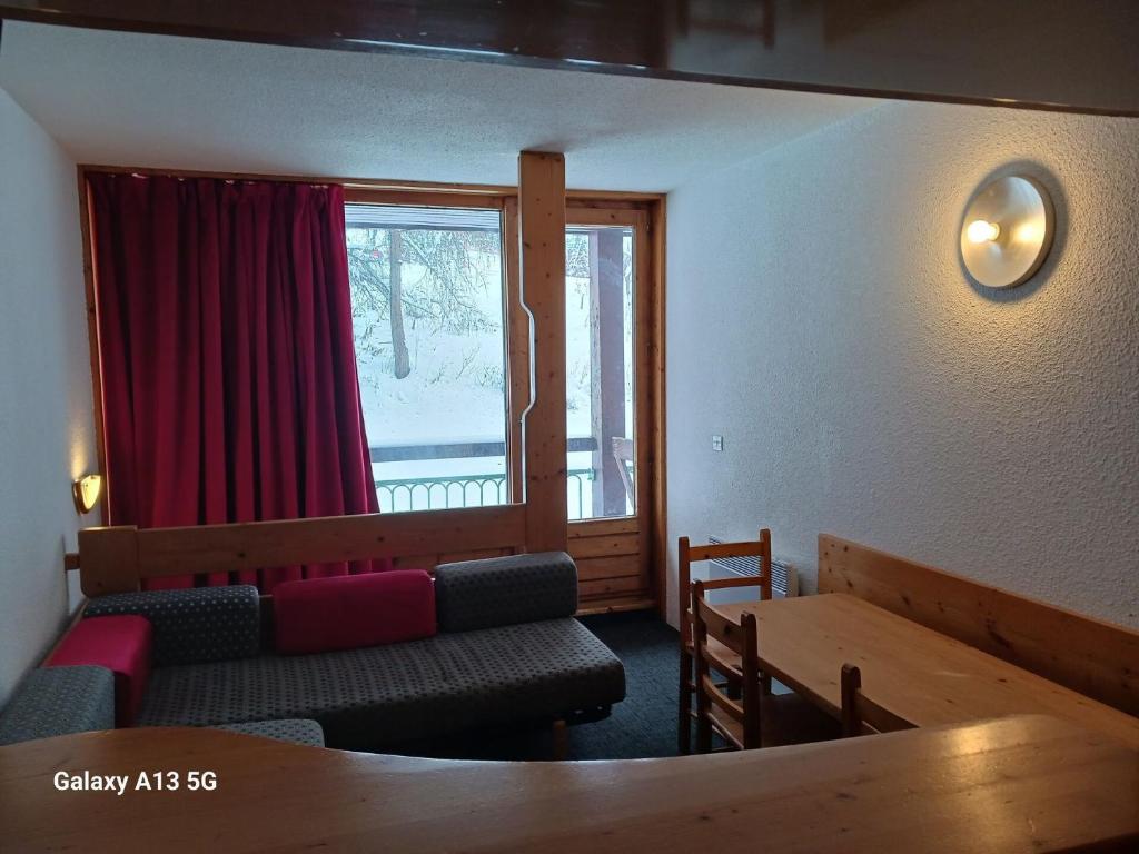 Résidence Lauzieres - Appartement 2 pièces pour 7 personnes skis aux pieds et proche des commerces dans le village du Charvet à Arc 1800 MAE-1876