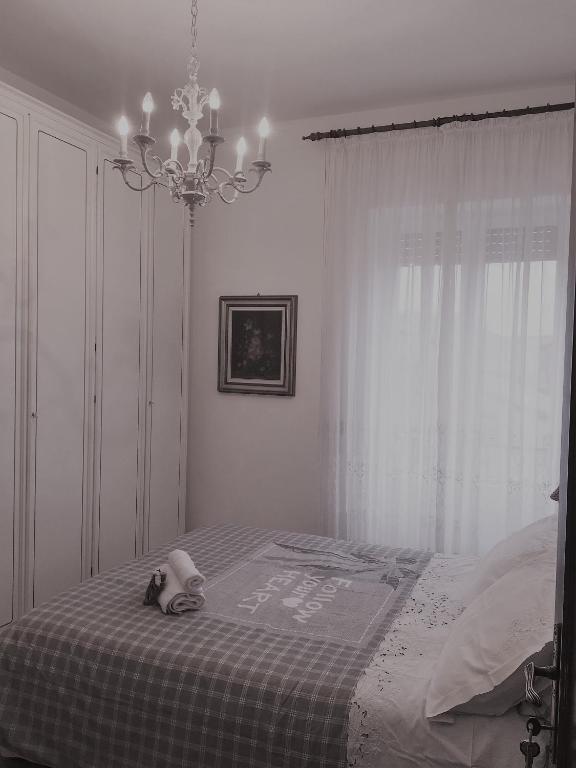 Łóżko lub łóżka w pokoju w obiekcie Atmosfera d'Arte - Private parking