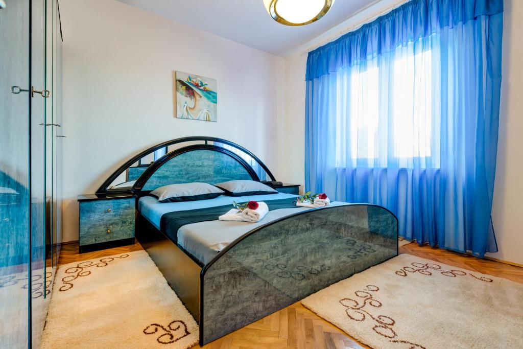 Posteľ alebo postele v izbe v ubytovaní Apartment Marinely