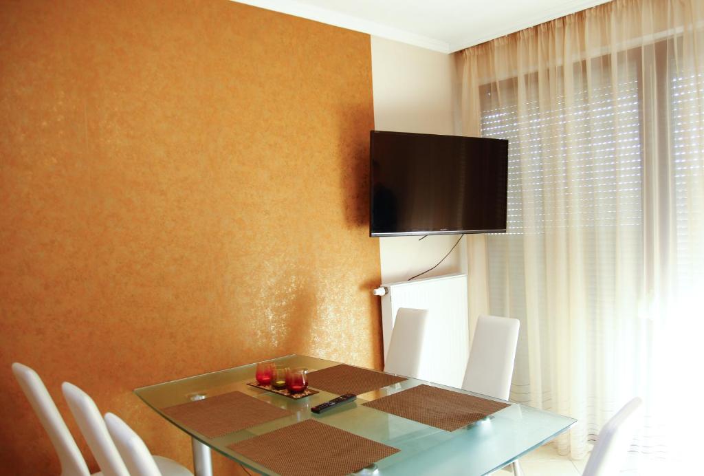 Telewizja i/lub zestaw kina domowego w obiekcie Princess Luxus Apartman