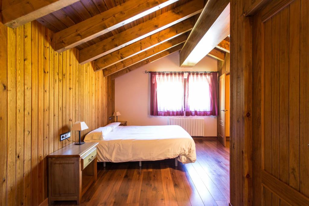 Cama o camas de una habitación en Apartaments Gran Vall