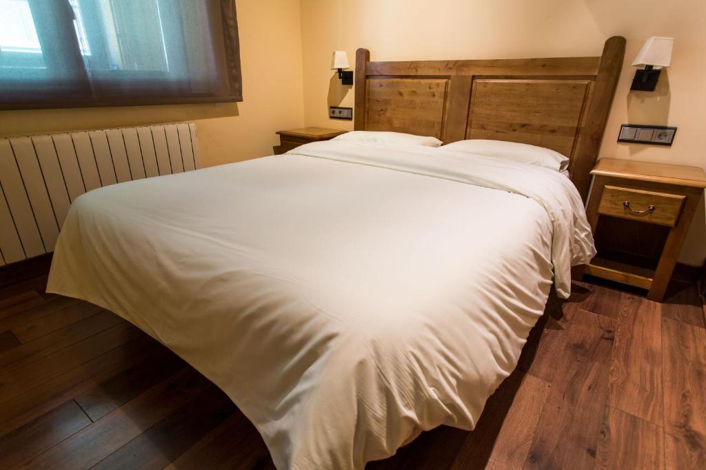 Cama o camas de una habitación en Apartaments Gran Vall