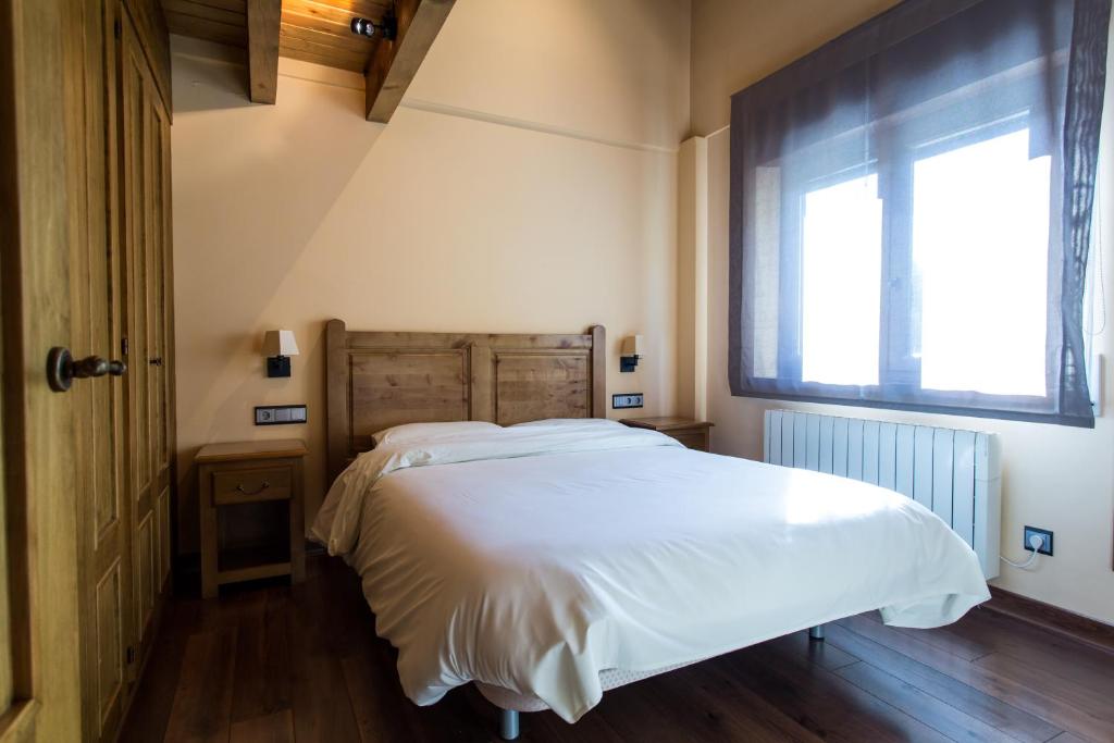 Cama o camas de una habitación en Apartaments Gran Vall