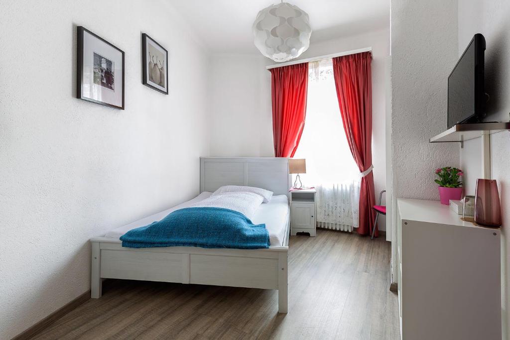 Postel nebo postele na pokoji v ubytování Hotel Croce Federale