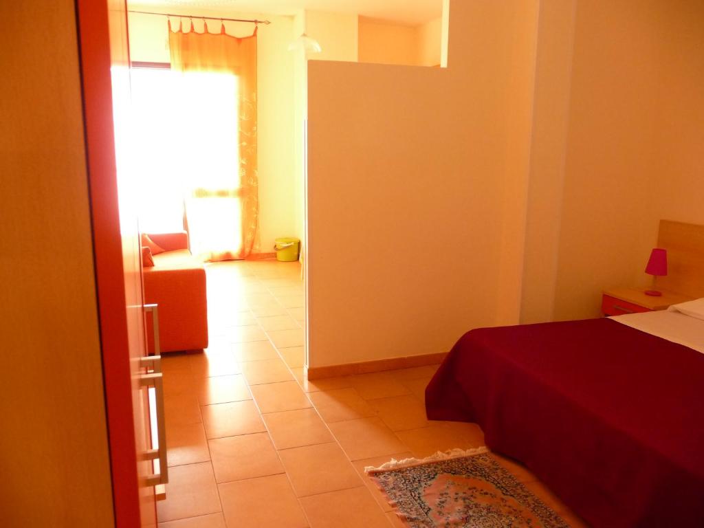 Postel nebo postele na pokoji v ubytování Agathae Hotel & Residence