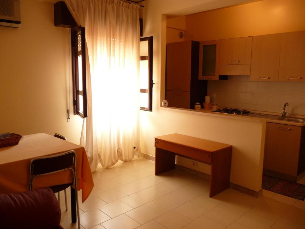 Kuchyň nebo kuchyňský kout v ubytování Agathae Hotel & Residence