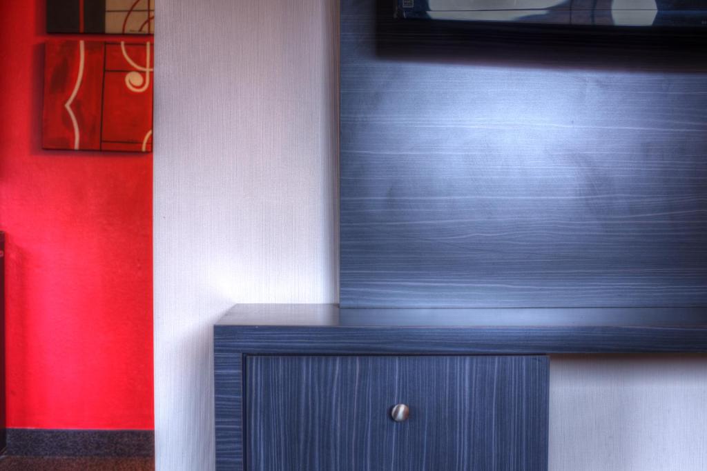 a blue cabinet sitting next to a wall at Hotel Ruby in Spokane