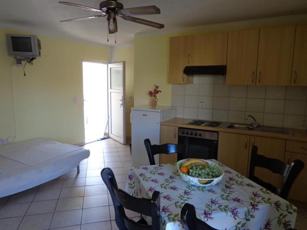 Apartments Popi - One bedroom apartment with balcony 1
