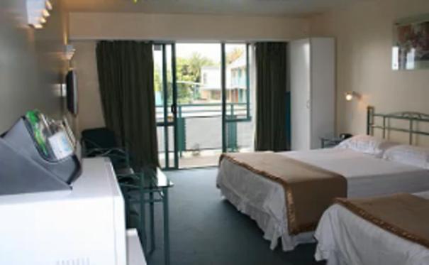Postel nebo postele na pokoji v ubytování Rayland Motel