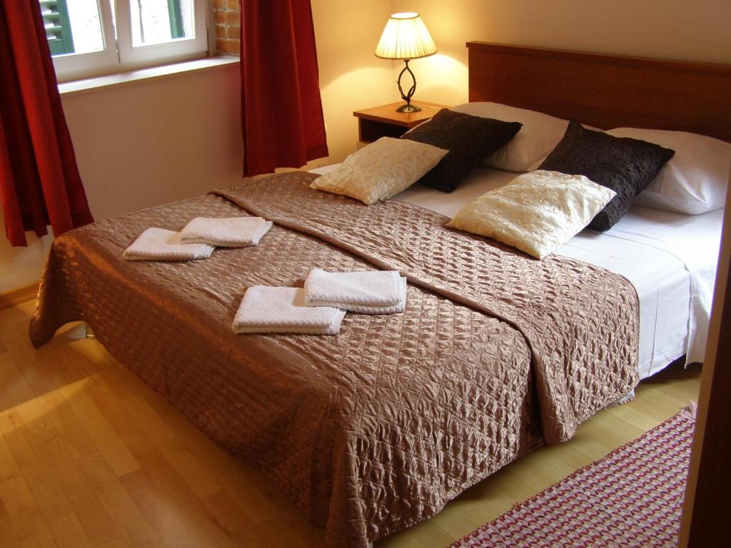 Voodi või voodid majutusasutuse Split Artistic Apartments toas