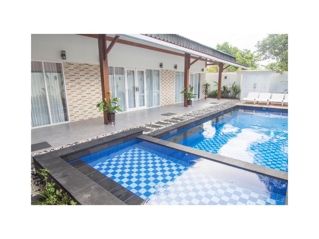 Bazén v ubytování KyGunAya Villa nebo v jeho okolí