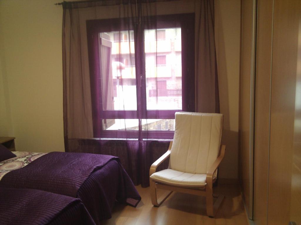 Postel nebo postele na pokoji v ubytování Apartamentos Argualas