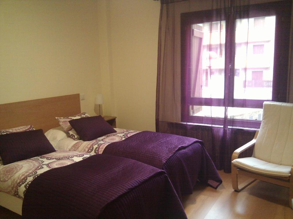 Postel nebo postele na pokoji v ubytování Apartamentos Argualas
