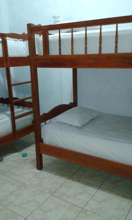 Postel nebo postele na pokoji v ubytování Ratih Bali Hostel