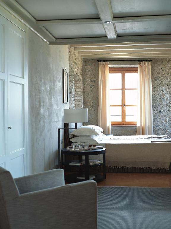 Postel nebo postele na pokoji v ubytování Villa Arcadio