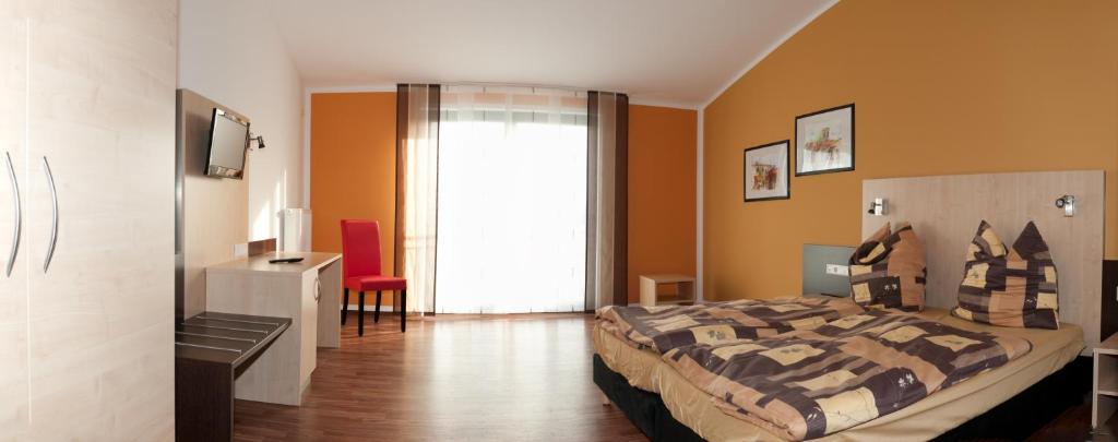 Postel nebo postele na pokoji v ubytování Auszeit Cafè & Hotel