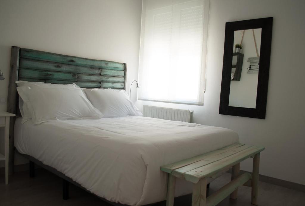 Postel nebo postele na pokoji v ubytování Hostal Gargal