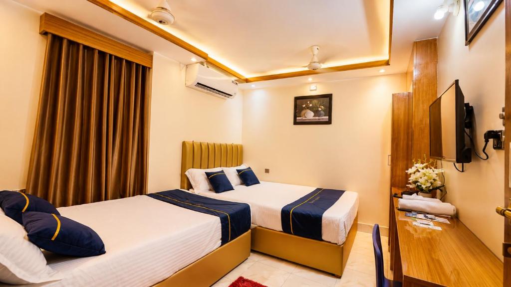 Hotel New Royal Palace Dhanmondi - Семейный номер люкс