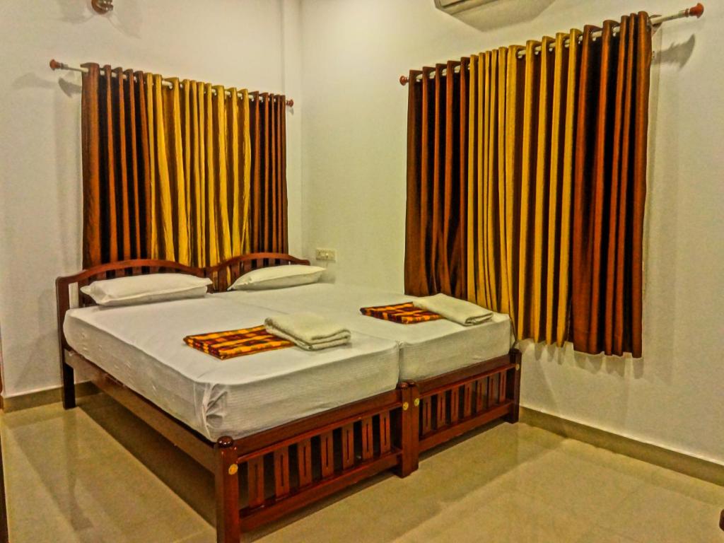 Ein Bett oder Betten in einem Zimmer der Unterkunft i - One's Home Stay