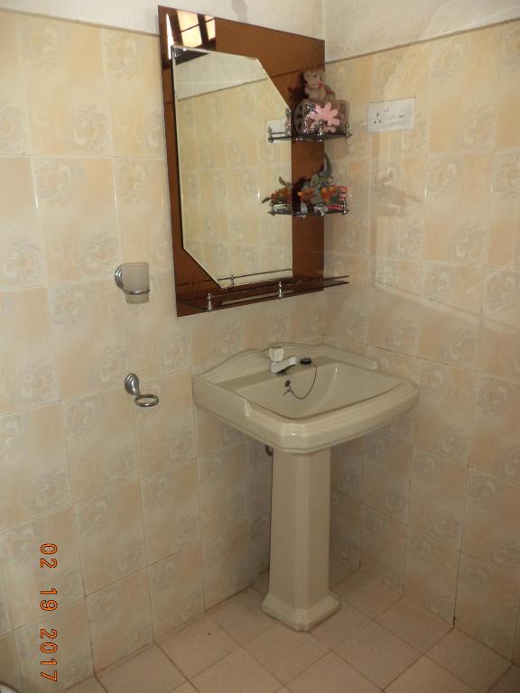 Koupelna v ubytování Raja174 Homestay