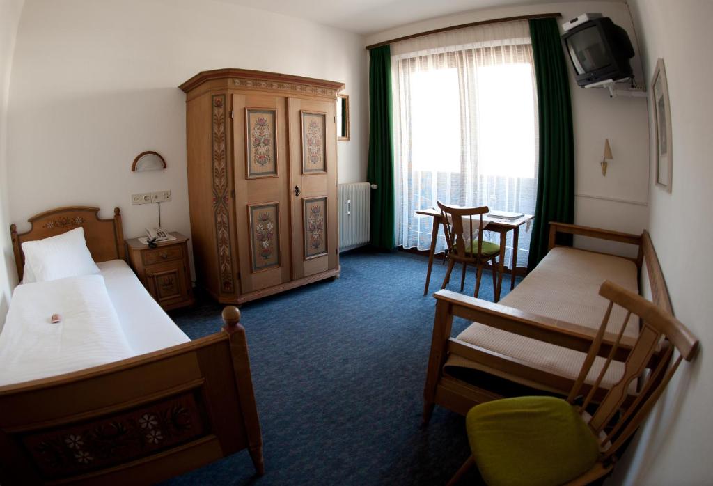 Postel nebo postele na pokoji v ubytování Gästehaus Obwexer