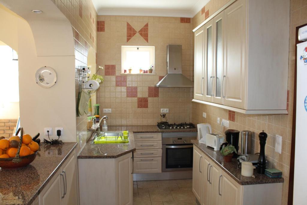 A cozinha ou cozinha compacta de Villa Lucy