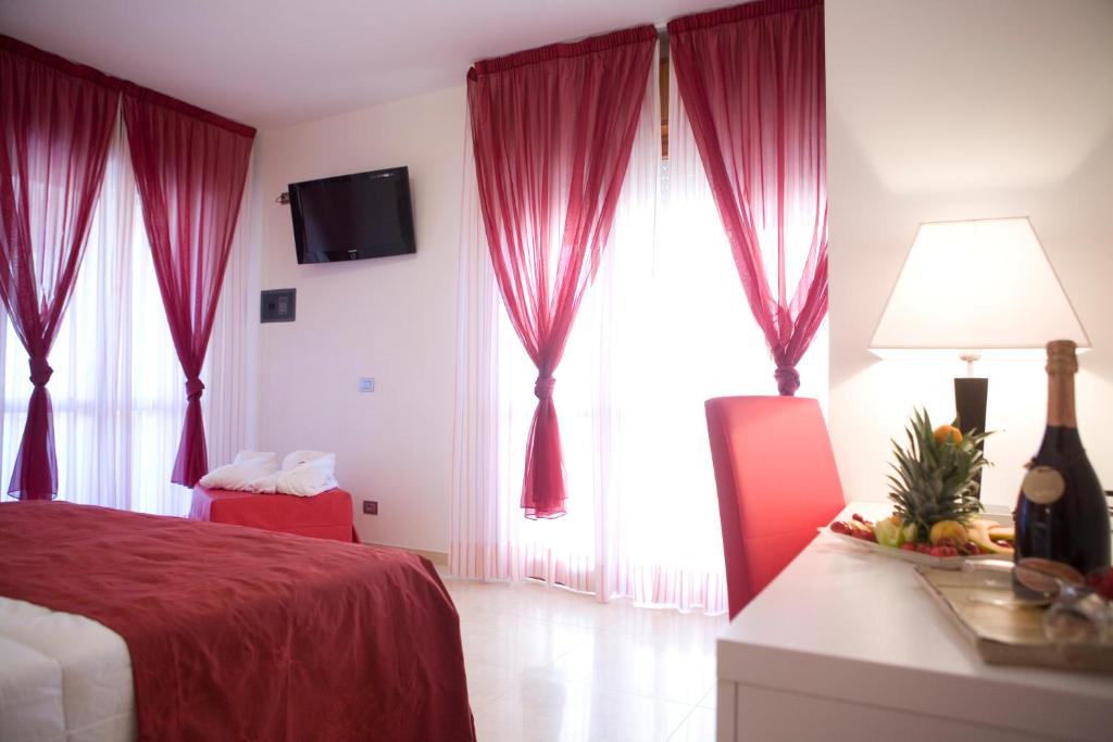 Postel nebo postele na pokoji v ubytování Hotel Palos