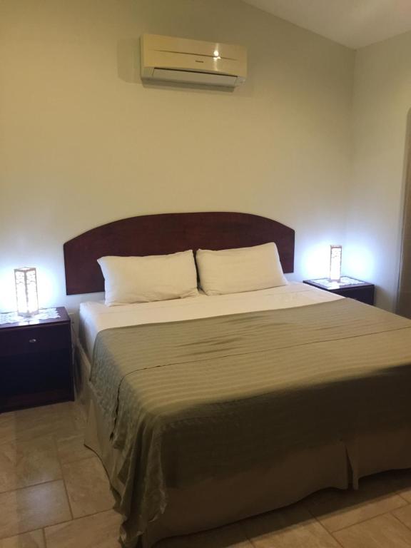 Postel nebo postele na pokoji v ubytování Guest House