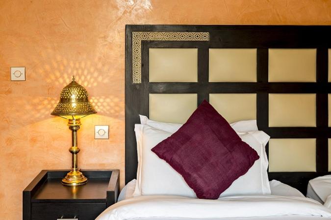 Postel nebo postele na pokoji v ubytování Marrakech House