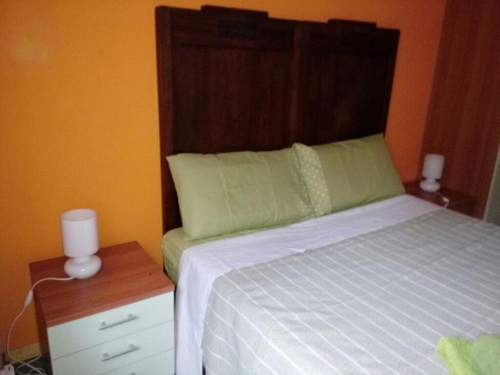 Postel nebo postele na pokoji v ubytování Casa Ivanka