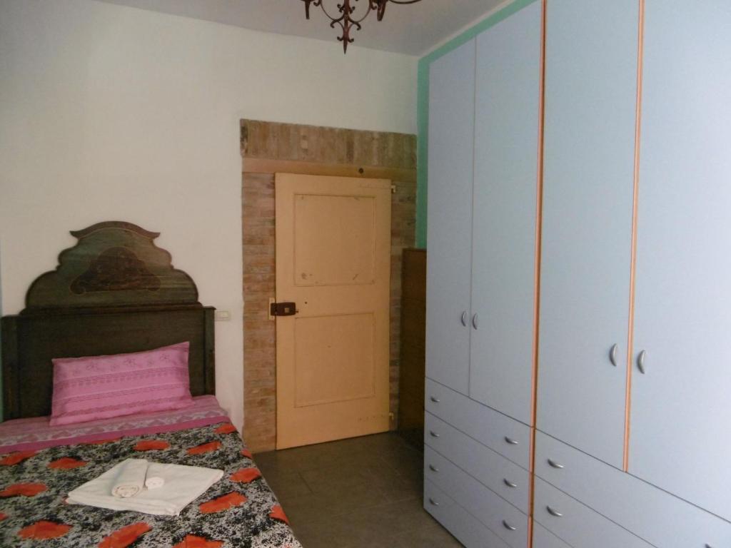 Postel nebo postele na pokoji v ubytování Casa Ivanka