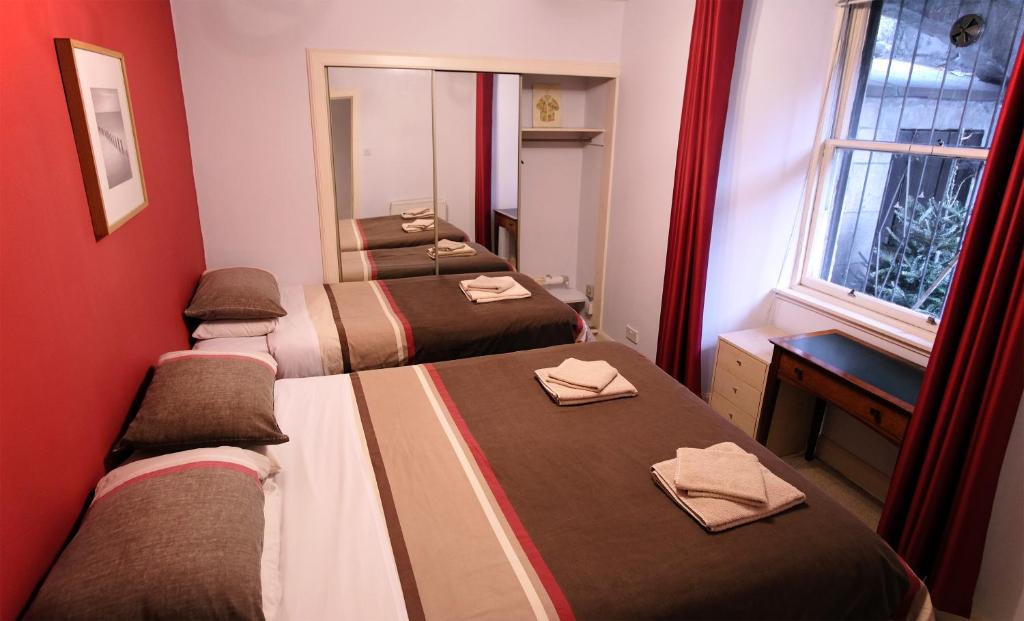 Postel nebo postele na pokoji v ubytování Regent House Hotel - City Centre Hotel