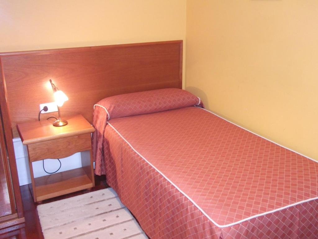Postel nebo postele na pokoji v ubytování Val de Serantes