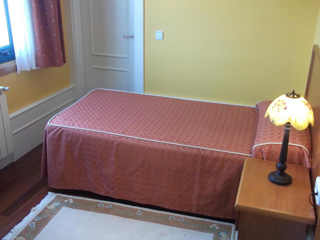 Postel nebo postele na pokoji v ubytování Val de Serantes