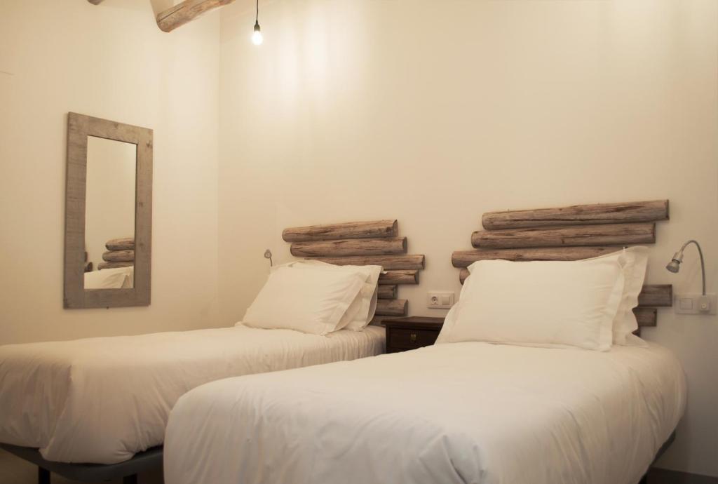 Postel nebo postele na pokoji v ubytování Hostal Gargal