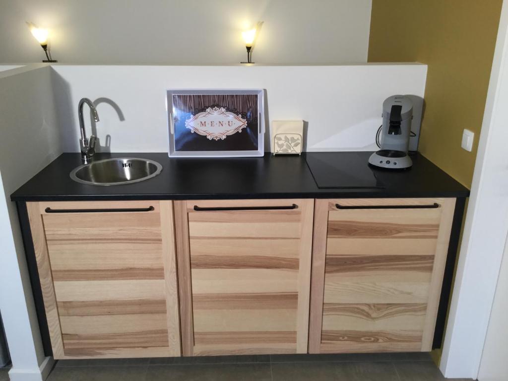 Kuchyň nebo kuchyňský kout v ubytování B&B 22