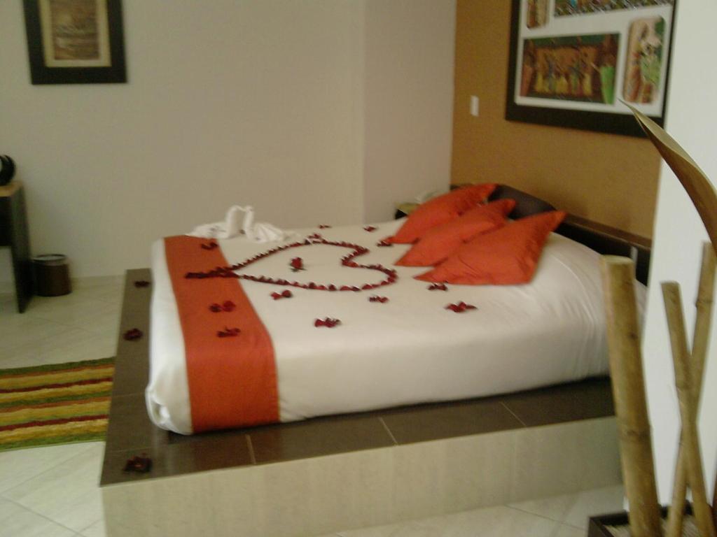 Postel nebo postele na pokoji v ubytování Hotel Real de TX