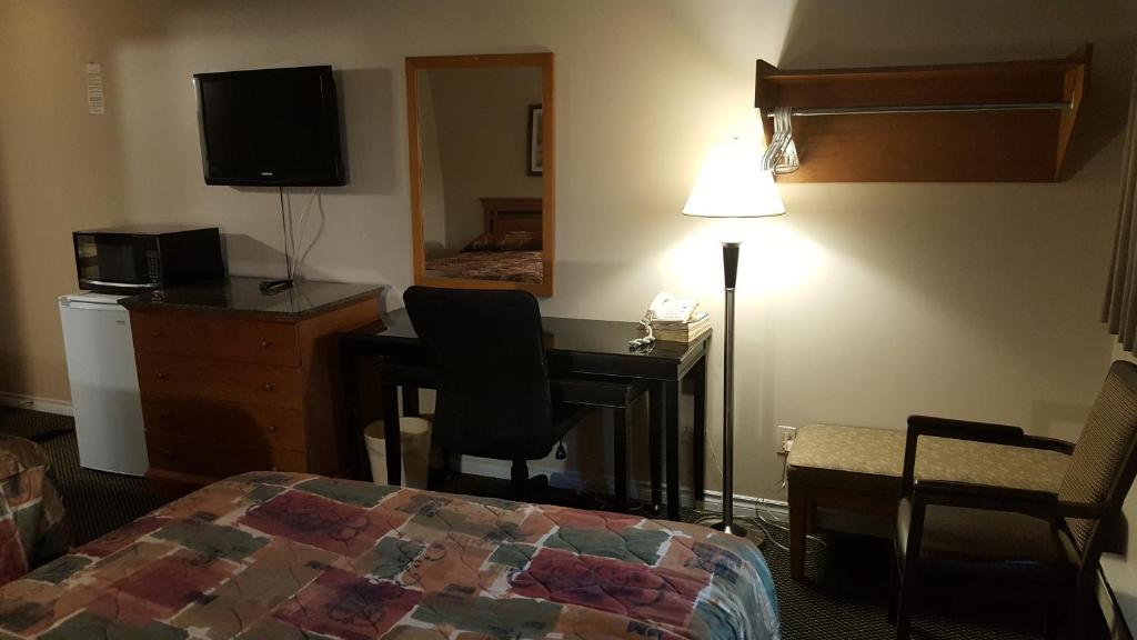 Kuchyň nebo kuchyňský kout v ubytování Sunrise Motel