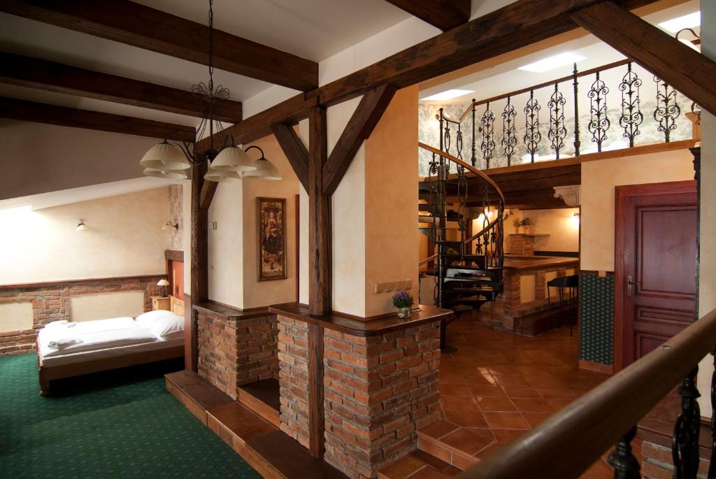 Postel nebo postele na pokoji v ubytování Hotel & Caffe Silesia