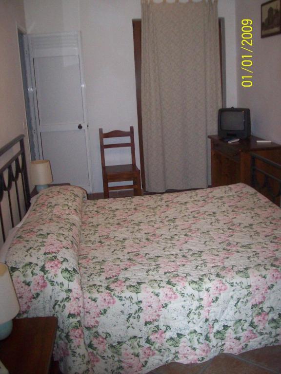 Postel nebo postele na pokoji v ubytování Albergo La Perla