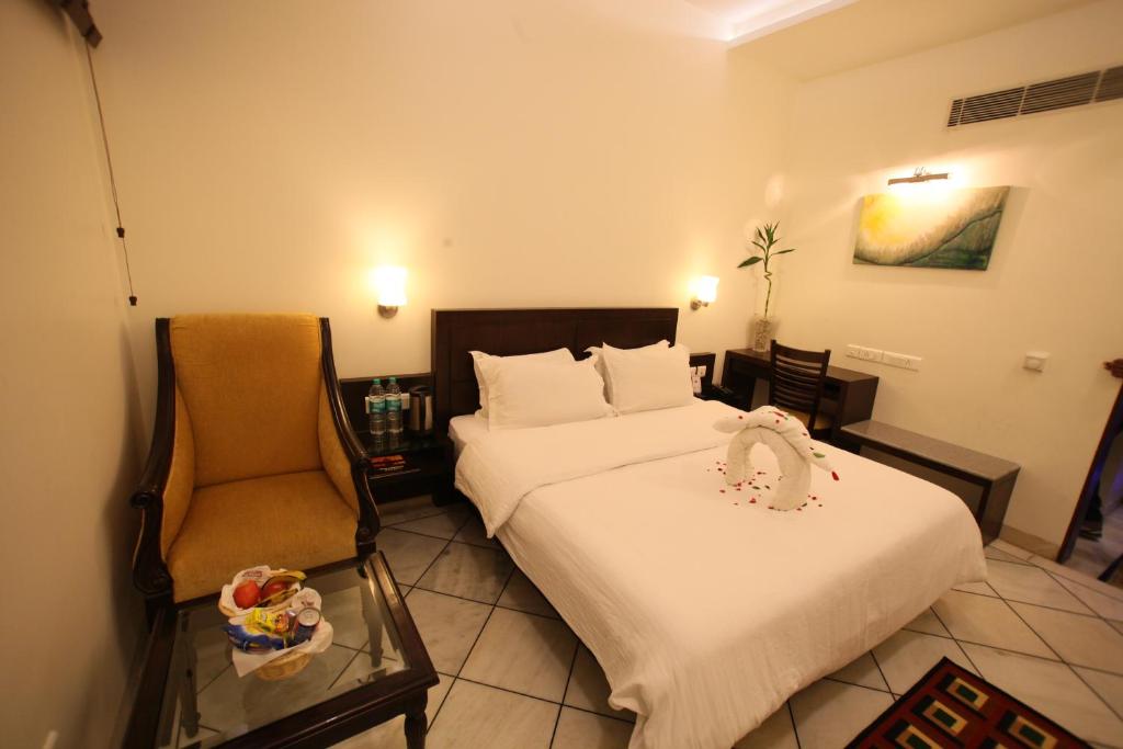 Postel nebo postele na pokoji v ubytování Hotel Taj Resorts