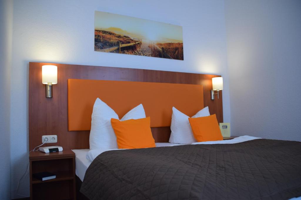 Postel nebo postele na pokoji v ubytování Hotel Amber Altstadt
