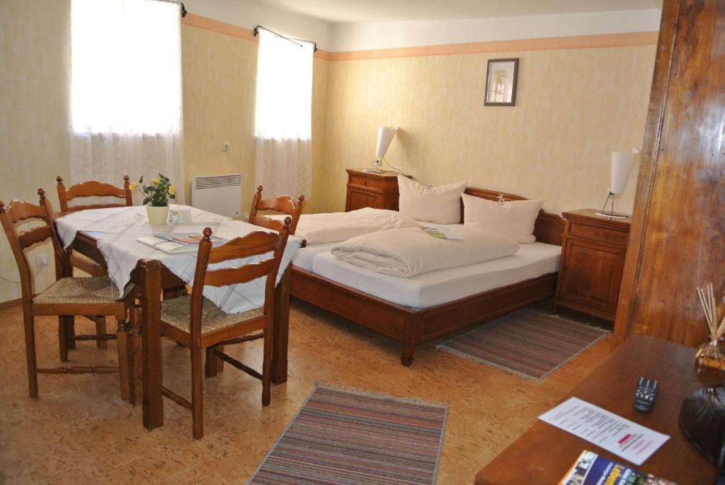 Postel nebo postele na pokoji v ubytování AKZENT Hotel Am Bach