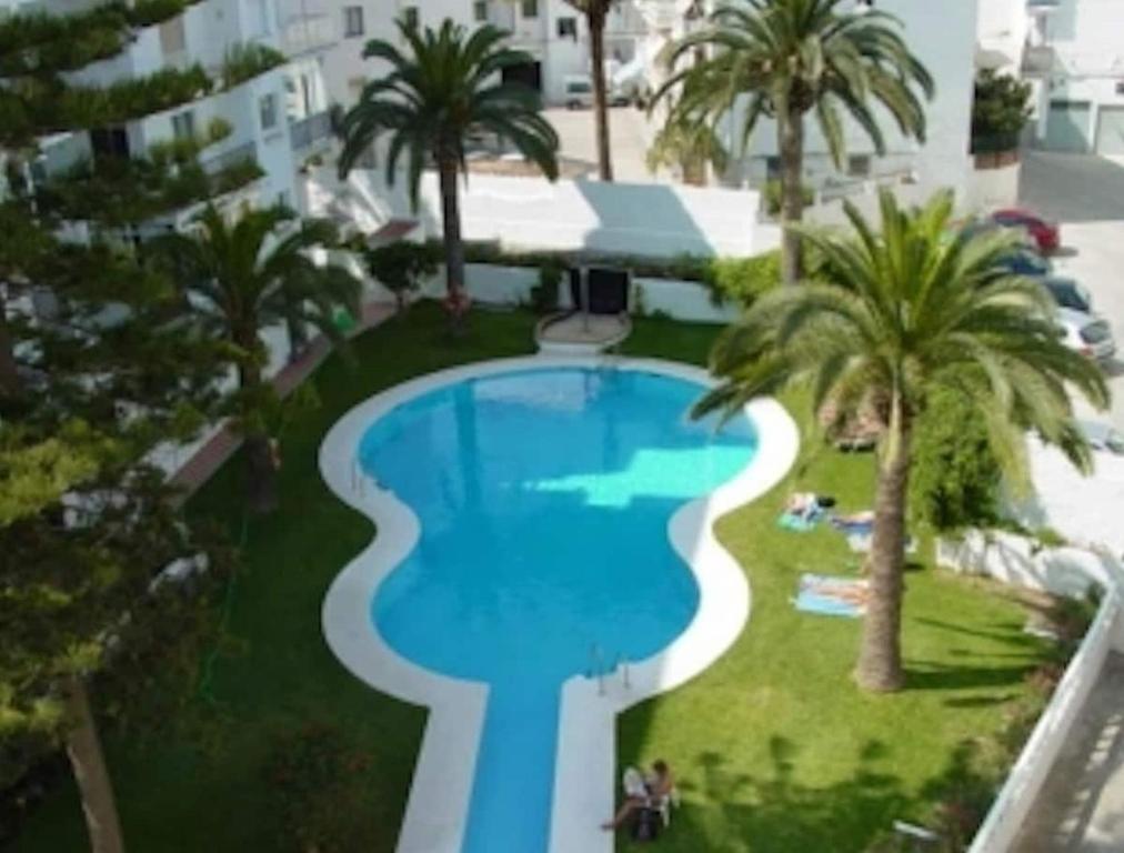APARTAMENTO CON PISCINA en el centro
