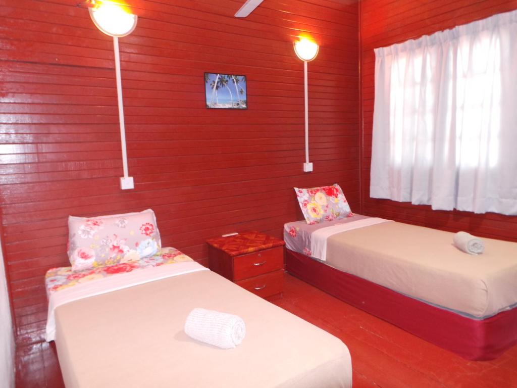 Postel nebo postele na pokoji v ubytování Senja Bay Resort